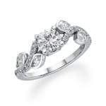 An elegant diamond engagement ring with a central round brilliant cut stone flanked by smaller diamonds in a unique, intertwined band design.