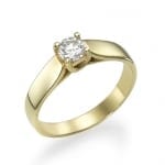 Elegant gold ring with a single sparkling diamond set in a classic solitaire design.