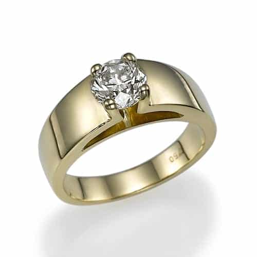 A polished gold ring featuring a prominent solitaire diamond set in a classic design.