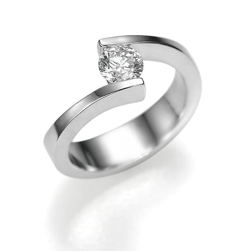 A solitary diamond ring with a sleek and elegant band, showcasing a modern and sophisticated design.