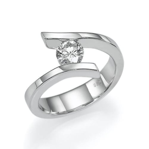 A sleek and modern silver ring with a single diamond set in a unique open band design.