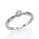 An elegant silver ring with a solitary diamond set in a prong setting, showcasing a classic and timeless design.