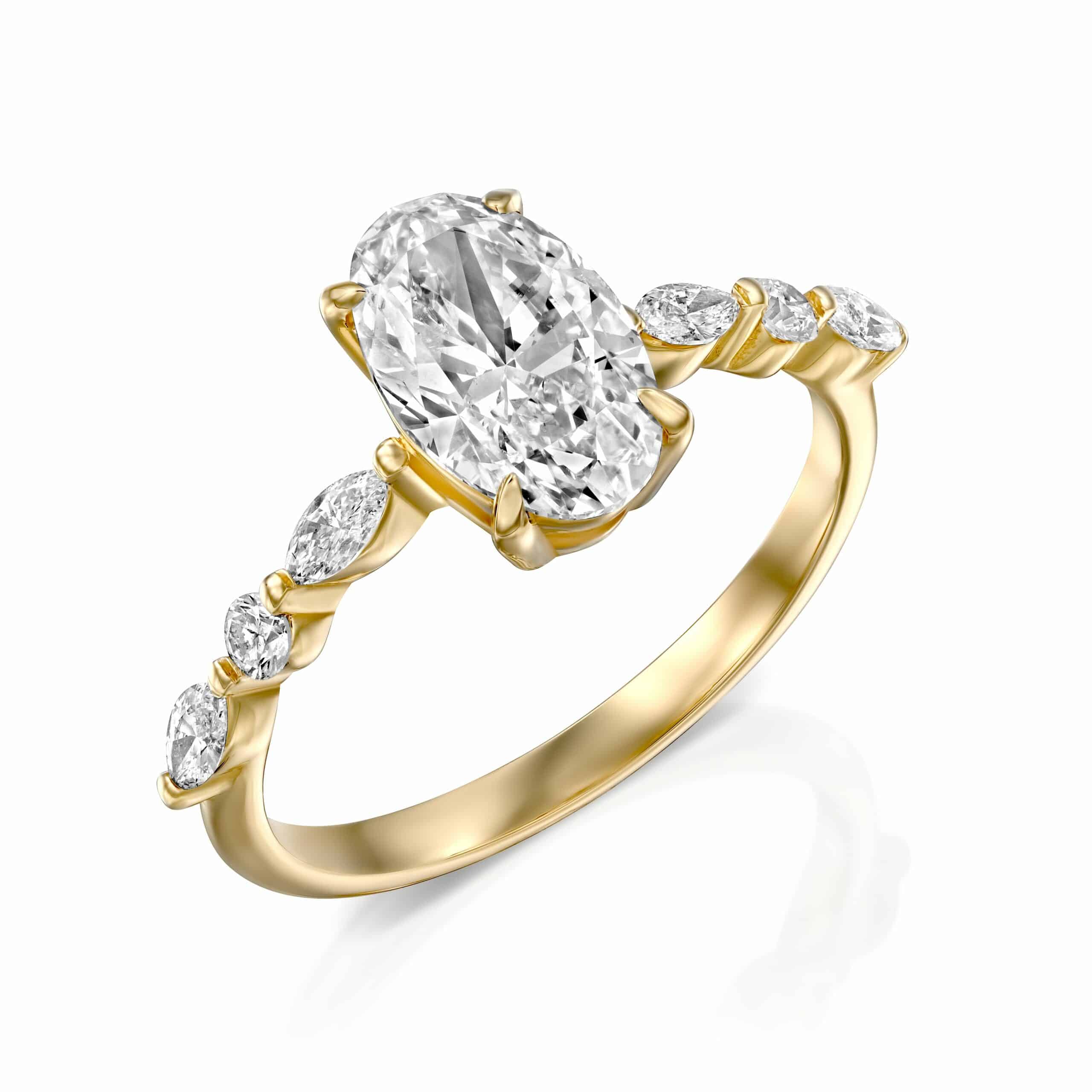 טבעת זהב אלגנטית הכוללת יהלום מרכזי בחיתוך אובלי כשלצידו יהלומים עגולים קטנים יותר וחיתוך מרקיז.